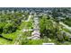 Aerial view of a home with a large backyard near a canal at 2631 Fiesta Dr, Venice, FL 34293