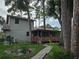 House exterior with screened porch and walkway at 2631 Fiesta Dr, Venice, FL 34293