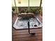 Relaxing hot tub on a wooden deck at 2631 Fiesta Dr, Venice, FL 34293