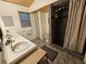 Bathroom with double vanity, shower, and stone tile floor at 2631 Fiesta Dr, Venice, FL 34293