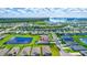 Aerial view showcases a single Gathering home with pool in a residential neighborhood at 16162 61St E Ln, Parrish, FL 34219