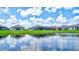 Property boasts a picturesque pond view at 16162 61St E Ln, Parrish, FL 34219