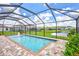 Screened rectangular pool with fountain and pavers at 16162 61St E Ln, Parrish, FL 34219