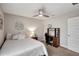 Serene bedroom featuring a queen-size bed and workspace at 16162 61St E Ln, Parrish, FL 34219
