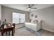 Cozy bedroom with built-in drawers and a desk area at 16162 61St E Ln, Parrish, FL 34219