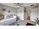 Spacious bedroom with daybed and access to a bathroom at 16162 61St E Ln, Parrish, FL 34219