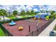 playground with swings, slides, and climbing structures at 16162 61St E Ln, Parrish, FL 34219