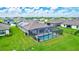 Aerial view highlighting pool and solar panels at 16162 61St E Ln, Parrish, FL 34219
