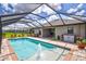 Screened pool with fountain and pavers; view from above at 16162 61St E Ln, Parrish, FL 34219