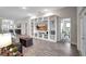 Spacious living area featuring a large built-in entertainment center and tile floors at 16162 61St E Ln, Parrish, FL 34219