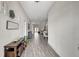 Bright entryway with tile floors and view to living room at 16162 61St E Ln, Parrish, FL 34219