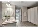 Clean bathroom with double vanity and walk-in shower at 16162 61St E Ln, Parrish, FL 34219