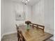 Dining room with wood table and six chairs at 16162 61St E Ln, Parrish, FL 34219