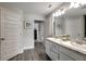 Modern bathroom with double vanity and granite countertop at 16162 61St E Ln, Parrish, FL 34219