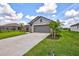 Single story home with attached two-car garage at 16162 61St E Ln, Parrish, FL 34219