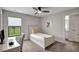 Charming bedroom with twin bed, workspace, and adjacent bathroom at 16162 61St E Ln, Parrish, FL 34219