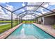 Screened pool with fountain and pavers; view from above at 16162 61St E Ln, Parrish, FL 34219