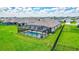 Overview of the house and backyard pool at 16162 61St E Ln, Parrish, FL 34219
