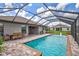 Screened pool with fountain and pavers; view from above at 16162 61St E Ln, Parrish, FL 34219