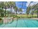 Screened pool and spa with a beautiful golf course view at 2570 Tom Morris Dr, Sarasota, FL 34240