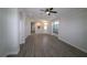 Spacious living room with luxury flooring, recessed lights and lots of natural light at 5107 Whispering Oaks Dr, North Port, FL 34287