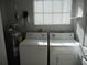 Laundry room with washer, dryer, and water heater at 5655 Bentgrass Dr # 9-112, Sarasota, FL 34235