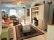 Living Room with a comfy couch and built-in shelving unit at 5850 Welcome Rd # J6, Bradenton, FL 34207