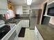 Well-equipped kitchen with stainless steel appliances at 5850 Welcome Rd # J6, Bradenton, FL 34207