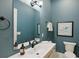 Modern bathroom with a floating vanity and a large mirror at 3973 Boca Pointe Dr, Sarasota, FL 34238