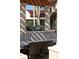 Relaxing outdoor patio seating area with pergola at 3973 Boca Pointe Dr, Sarasota, FL 34238