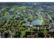 Expansive aerial view of community and golf course at 3973 Boca Pointe Dr, Sarasota, FL 34238