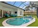Enclosed pool and spa with seating area at 3973 Boca Pointe Dr, Sarasota, FL 34238