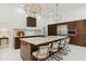 Modern kitchen with large island, stainless steel appliances, and custom cabinetry at 3973 Boca Pointe Dr, Sarasota, FL 34238