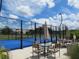 Enjoy resort-style living with this community paddle tennis court at 4939 Lakescene Pl, Sarasota, FL 34243