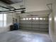Attached garage with automatic door opener and storage at 4939 Lakescene Pl, Sarasota, FL 34243