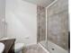 Clean bathroom with a large shower and grey tile at 6428 Boxgrove Dr, Sarasota, FL 34240