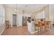 Modern kitchen with stainless steel appliances and an island with seating at 5111 51St W Ln, Bradenton, FL 34210