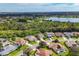 Aerial view of a cul-de-sac neighborhood with lake view at 5111 51St W Ln, Bradenton, FL 34210