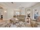 Spacious living room featuring comfortable seating and a large area rug at 5111 51St W Ln, Bradenton, FL 34210