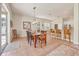 Bright dining room with table and chairs, adjacent to kitchen at 5111 51St W Ln, Bradenton, FL 34210