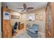Cozy den with comfortable seating and built-in shelving at 2611 Sunnyside St, Sarasota, FL 34239