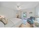 Bright bedroom with patio access and relaxing sitting area at 2611 Sunnyside St, Sarasota, FL 34239