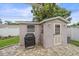Private backyard workshop with a grilling station at 2611 Sunnyside St, Sarasota, FL 34239