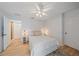 Main bedroom with a comfortable bed and backyard access at 2611 Sunnyside St, Sarasota, FL 34239