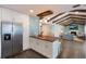 Island kitchen with white cabinets and a wood countertop at 305 55Th Nw St, Bradenton, FL 34209