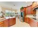 Island kitchen with granite countertops and breakfast nook at 7606 91St E St, Palmetto, FL 34221