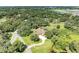 Aerial view highlighting home's private lot and surrounding nature at 7606 91St E St, Palmetto, FL 34221