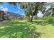 Large backyard with a pool and lush landscaping at 7606 91St E St, Palmetto, FL 34221
