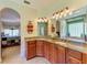 Double vanity bathroom with granite countertop and large shower at 7606 91St E St, Palmetto, FL 34221