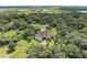 Aerial view of home with pool and extensive green space at 7606 91St E St, Palmetto, FL 34221